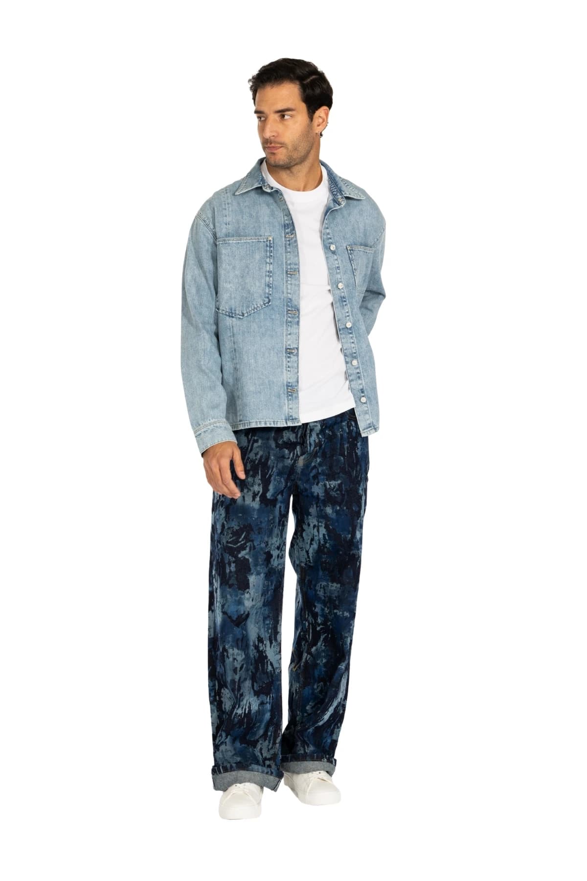 Denim Moon men's light blue denim shirt worn open over a white T-shirt, angled front view on model.