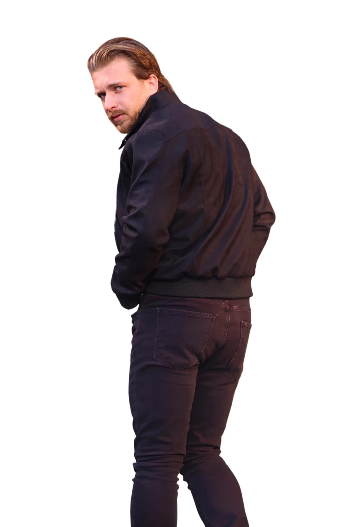 Denim Moon men's black slim-fit denim trousers with back pockets and a narrow leg, three-quarter back view on model.