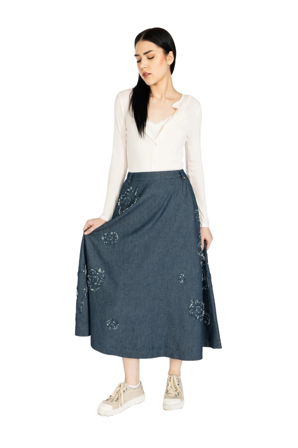 Denim Moon women's dark indigo midi A-line denim skirt with a fluid flared cut, full-length front view on model.
