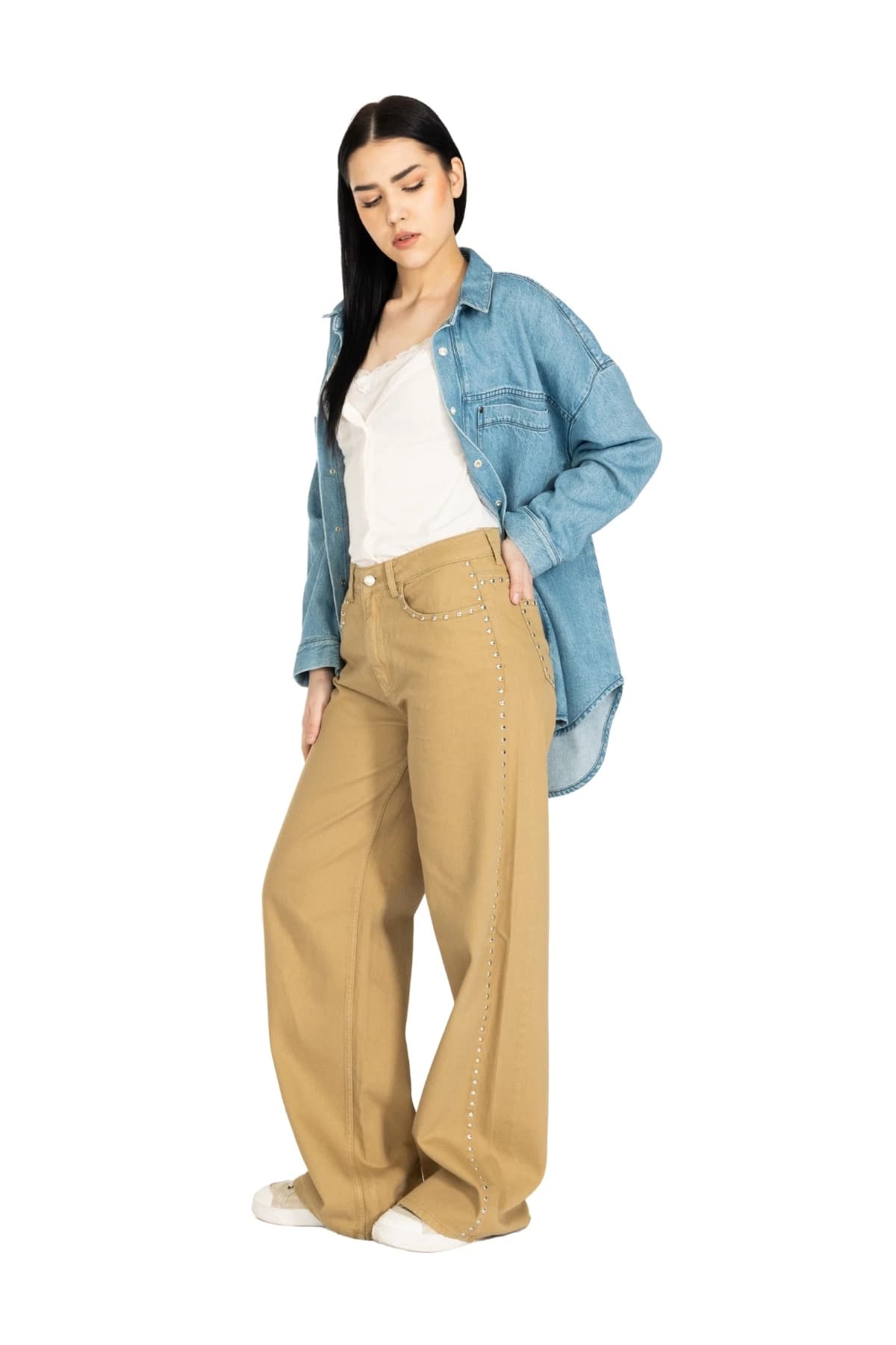 Denim Moon women's mid blue oversized denim shirt with curved hem, full-length three-quarter front view on model.