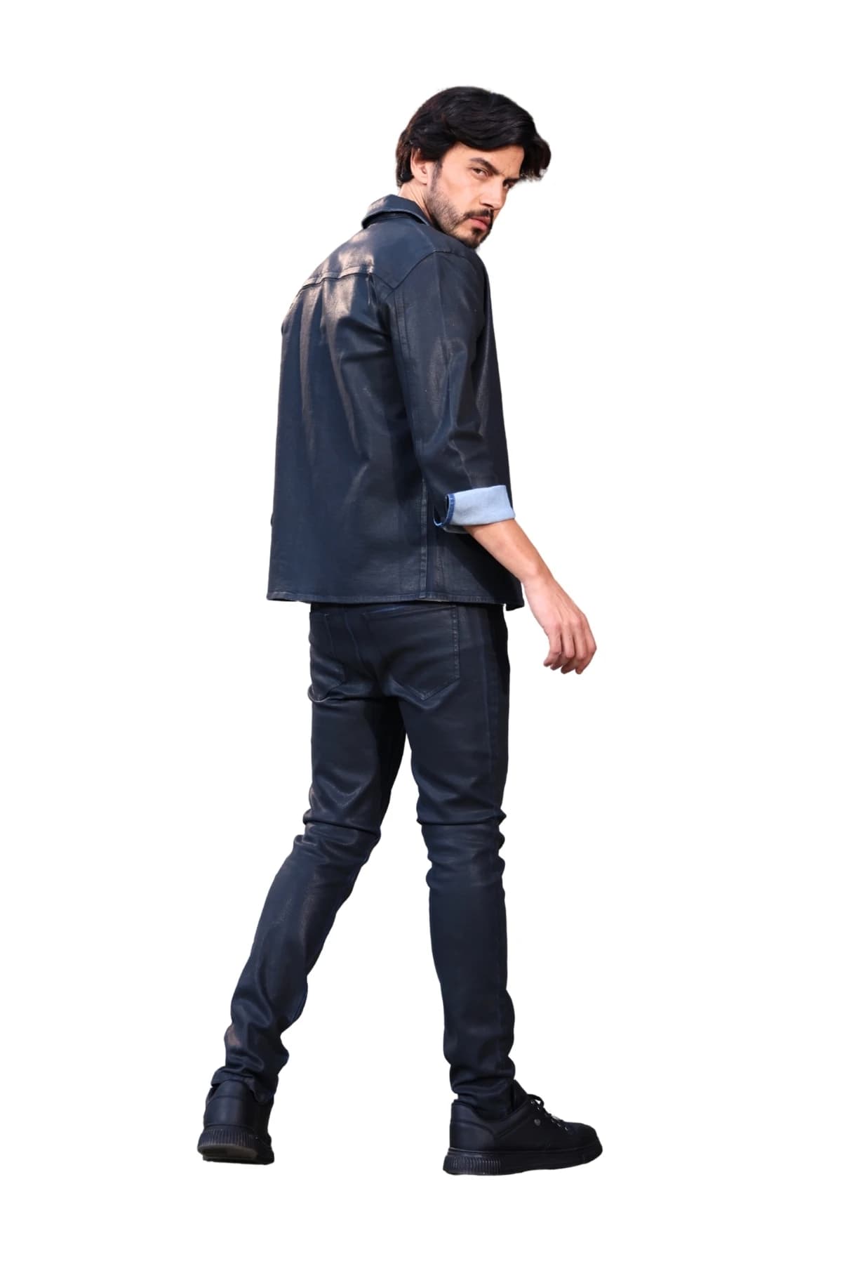 Denim Moon men's dark navy coated slim-fit denim trousers with back pockets, full-length three-quarter back view on model.