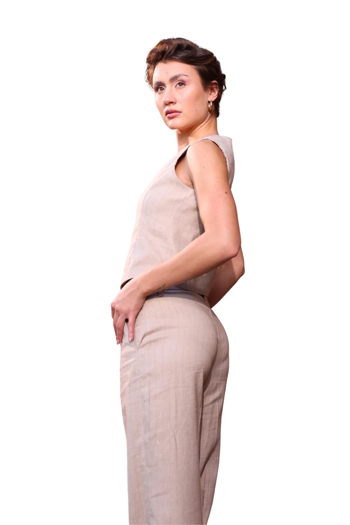Denim Moon women's beige woven vest with a sleeveless cut, three-quarter back view on model.