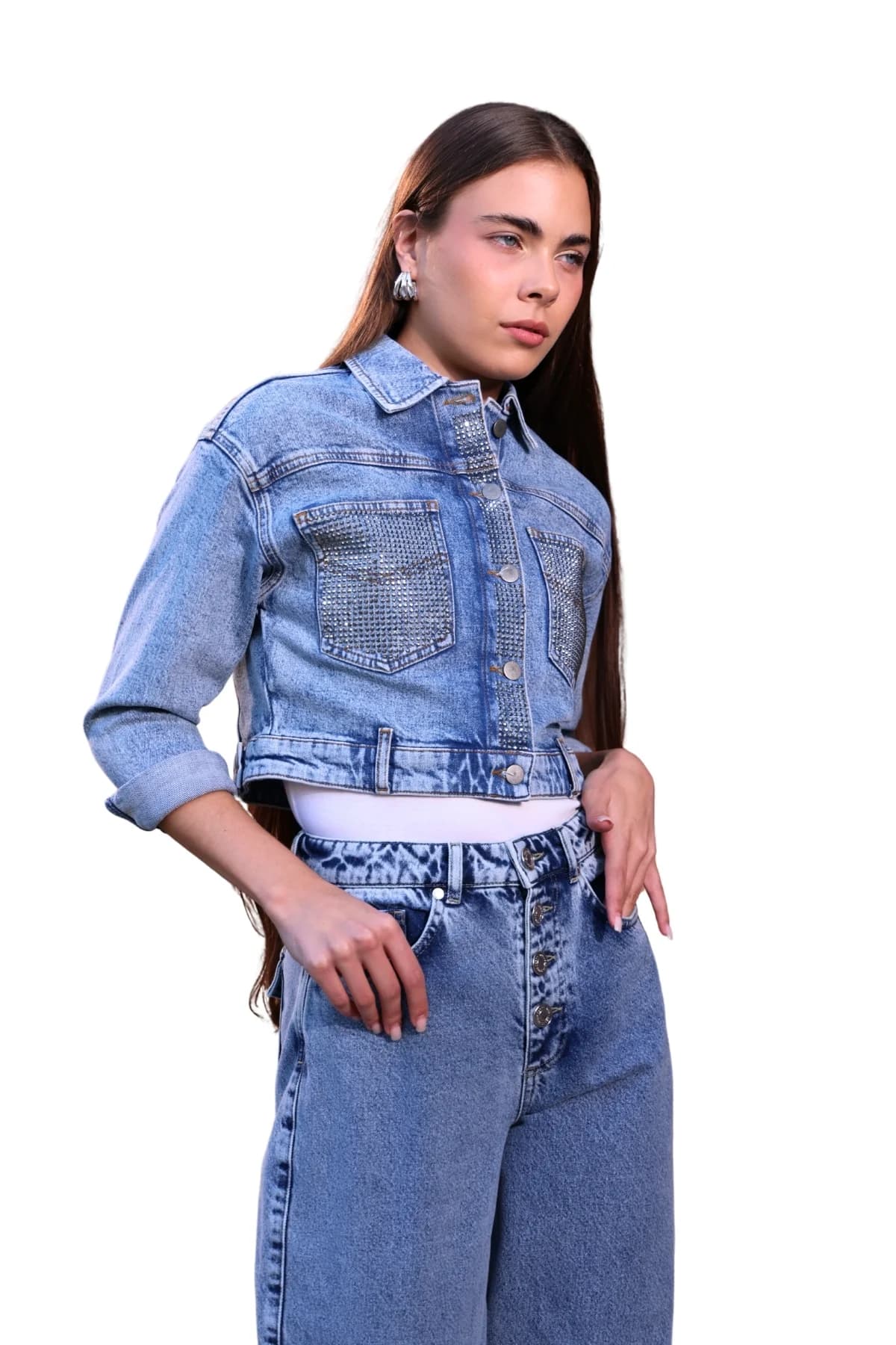 Denim Moon women's mid blue cropped denim jacket with metal button front and rhinestone pockets, front view on model.