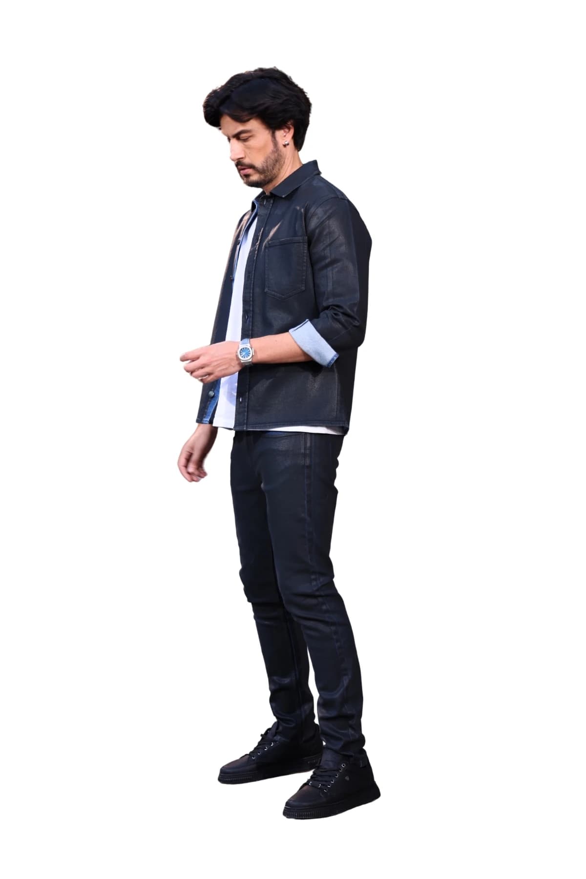 Denim Moon men's dark navy coated slim-fit denim trousers with a slim fit, full-length side view on model.
