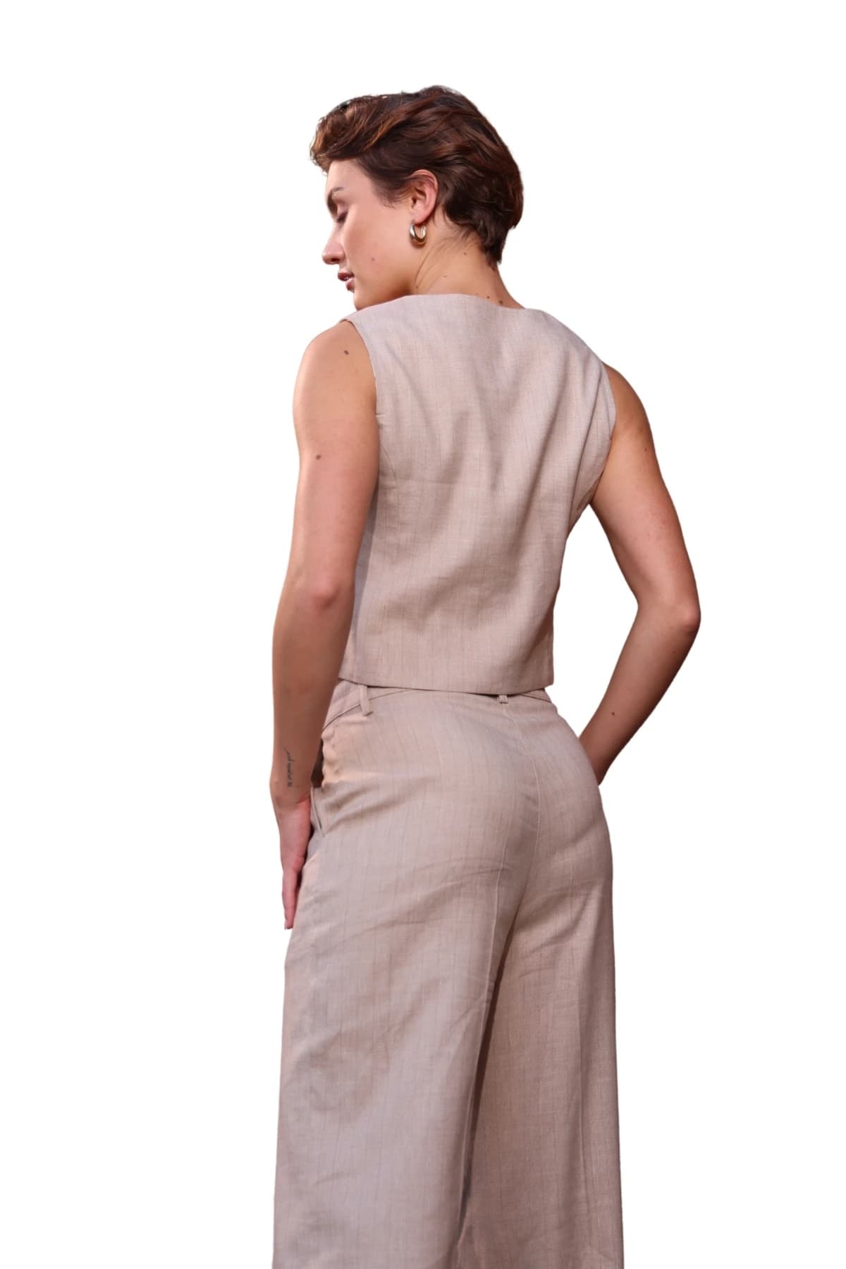 Denim Moon women's beige woven vest with a clean back design, back view on model.